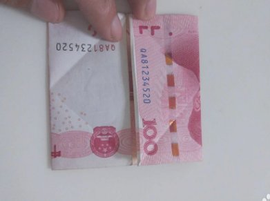 100元折爱心的步骤图解