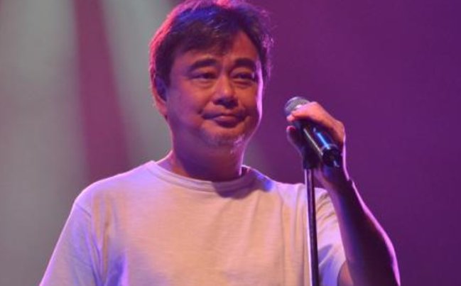 把悲伤给自己歌曲原唱是谁？