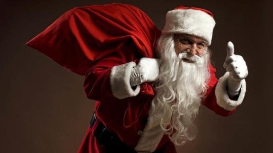 圣诞老人什么时候把礼物送到我的床头？